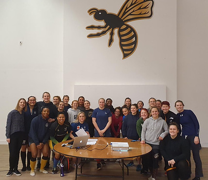 Emily running a women's rugby workshop